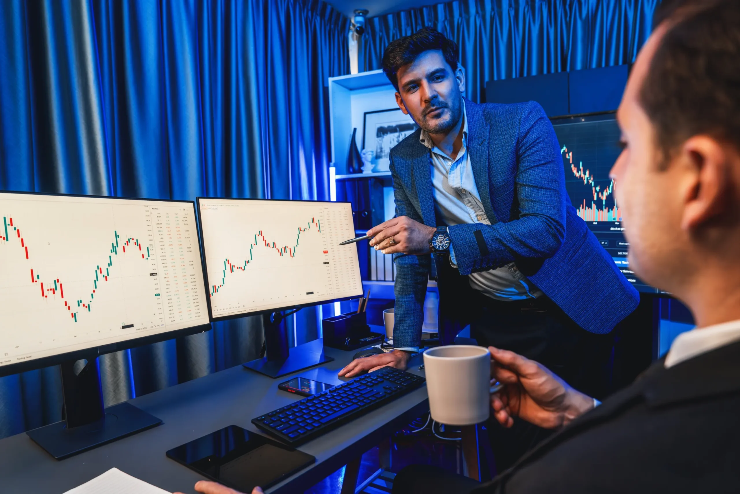 two-stock-exchange-traders-discussing-dynamic-investment-graph-currency-rate-monitor-night-businessman-partners-coffee-meeting-high-stock-market-neon-light-workplace-sellable